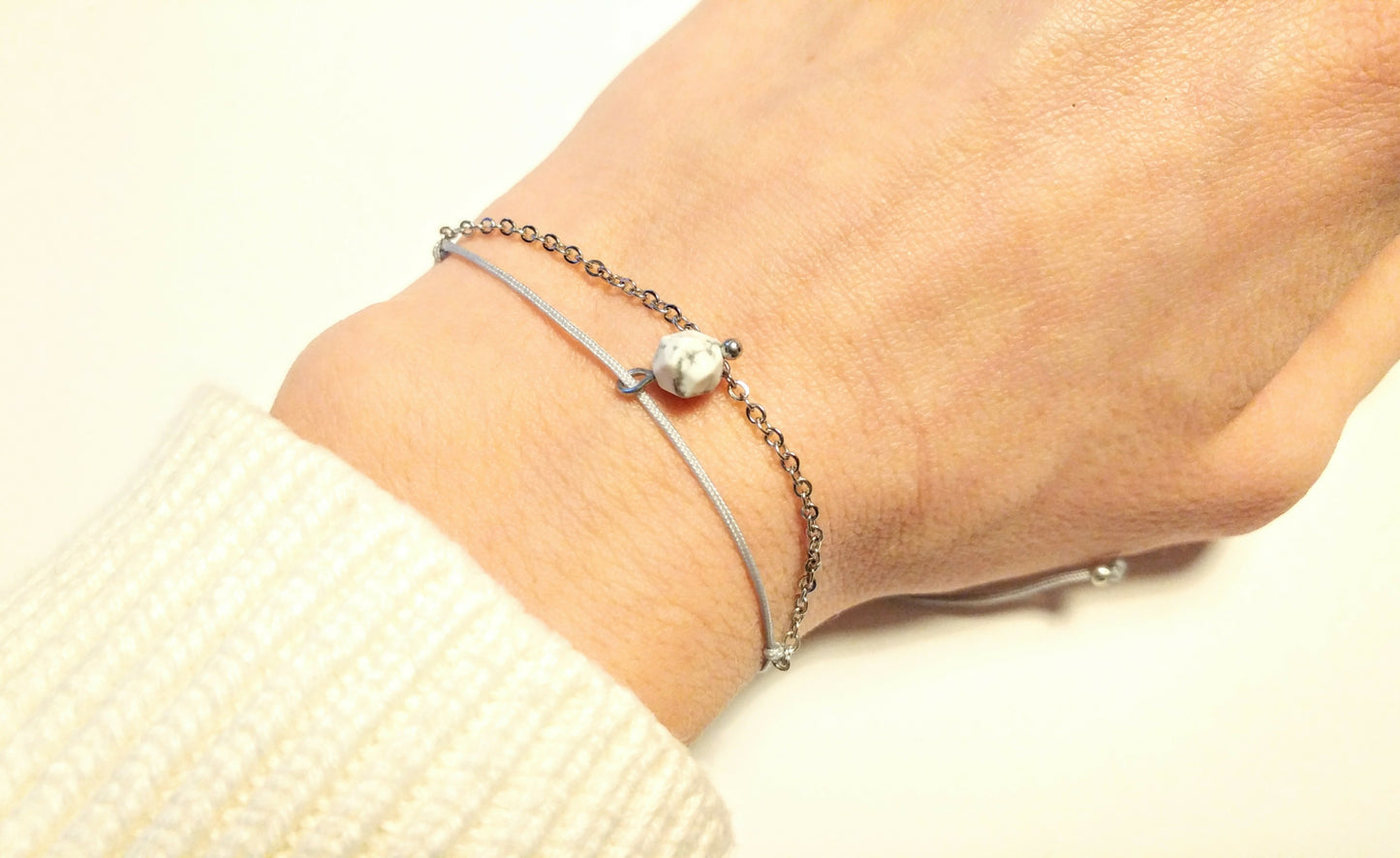 Delicate bracelet with stainless steel, gemstone pendant and textile cord
