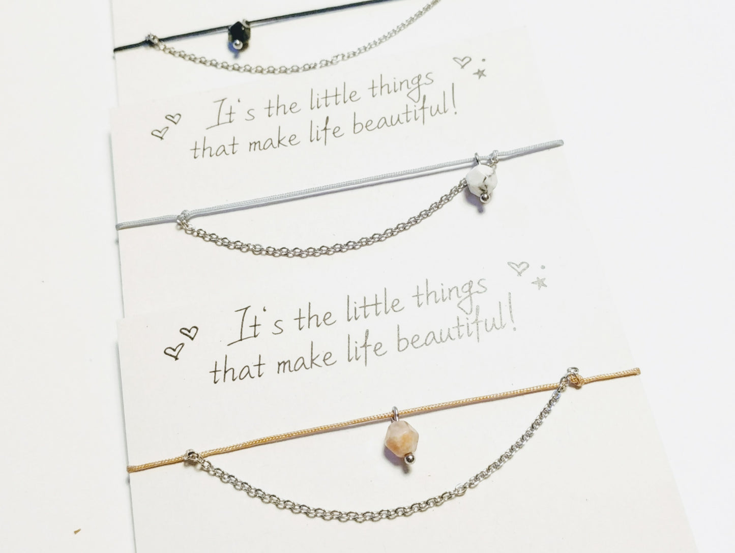 Delicate bracelet with stainless steel, gemstone pendant and textile cord