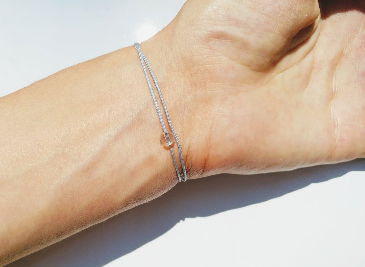 Minimalistisches Bergkristall Armband Rautenform | schwarz grau beige