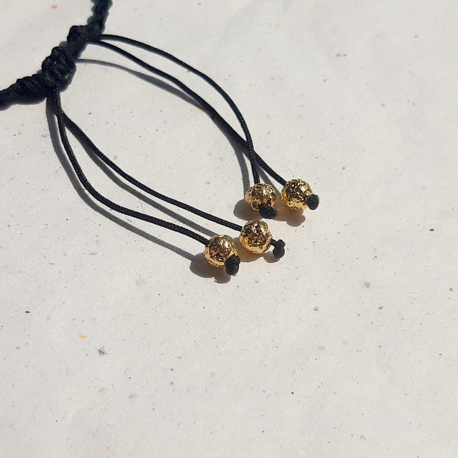 Love Revolution Armband gold & schwarz | pia norden