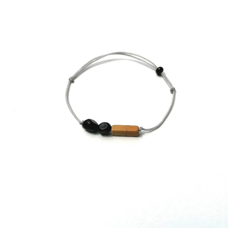 Armband - Schwarzer Turmalin, versteinertes Holz, Textilkordel in grau