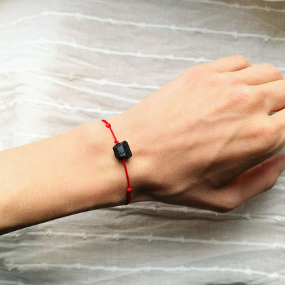 Black tourmaline bracelet with red cord