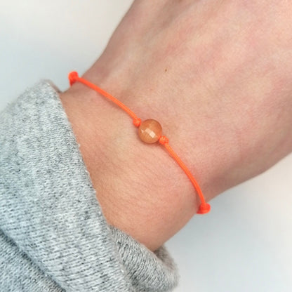 orange rosa Sonnenstein Armband mit Nylonkordel in neonorange von pia norden